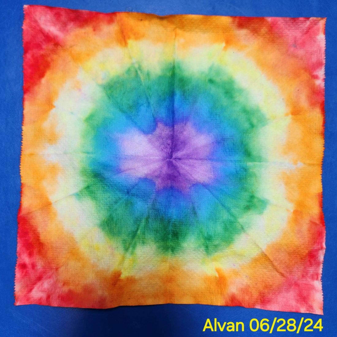 A colorful tie-dye project created by a child